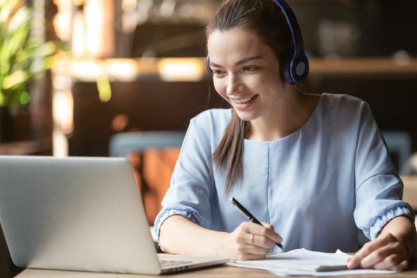 Smiling,Girl,Student,Wear,Wireless,Headphone,Study,Online,With,Skype