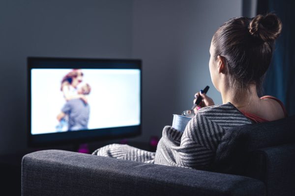 Woman,Watching,Romantic,Movie,And,Eating,Ice,Cream.,Sad,Lonely
