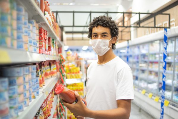 22-year-old,Man,With,Protective,Mask,Makes,Purchase,In,Supermarket