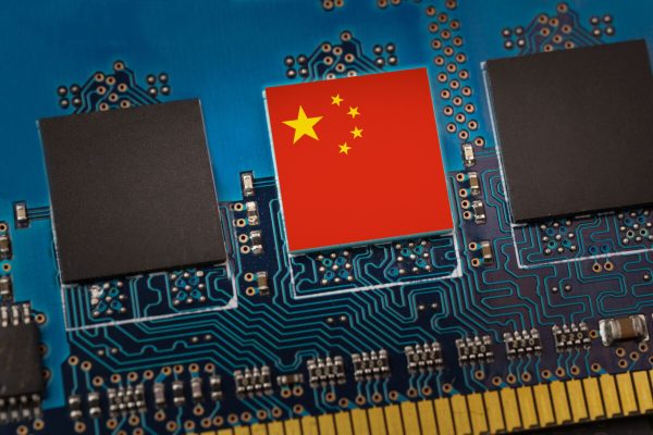 China,Flag,In,The,Center,Of,A,Circuit,Board.,Concept