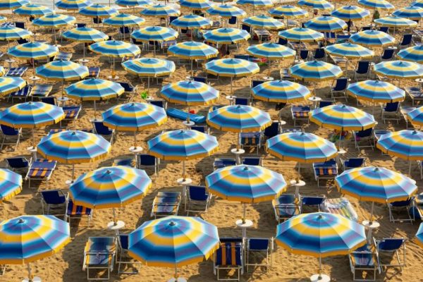 Summer,Blue,Yellow,Beach,Umbrellas,On,A,Sand,,Adriatic,Sea