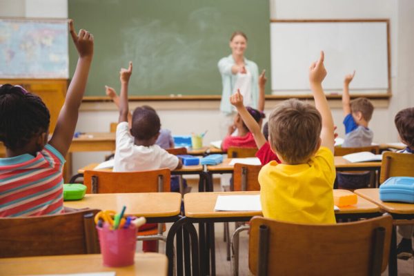 Pupils,Raising,Their,Hands,During,Class,At,The,Elementary,School