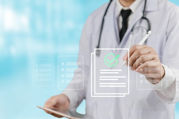 A,Health,Care,Professional,Working,Medical,Checklist,To,Verify,Patient