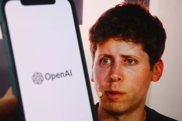 Sam,Altman,With,Openai,Blurry,Logo,Background.,New,York,,Us