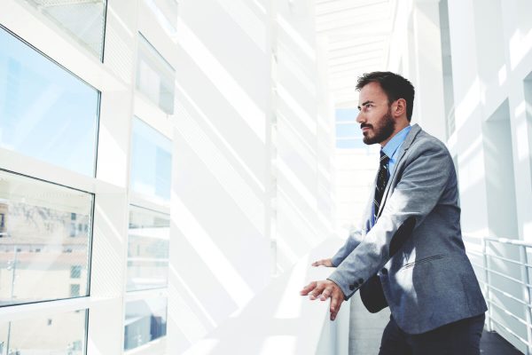 Portrait,Of,A,Young,Successful,Businessman,Thinking,About,Something,While