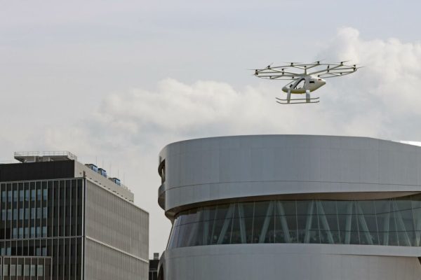 epa07841820 The electrically powered air taxi Volocopter makes a presentation flight in Stuttgart on the grounds of the Mercedes Museum in Stuttgart, 14 September 2019. The volocopter is piloted from the ground by a pilot. The flight in Stuttgart is part of a research project by the state government and the Stuttgart University of Applied Sciences.  EPA/Franziska Kraufmann