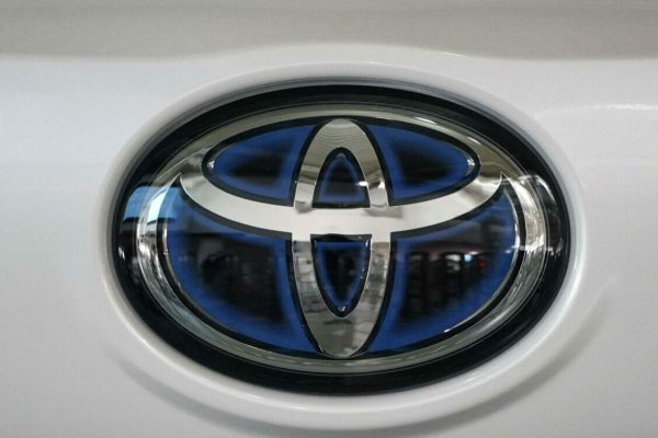epa09192978 A Toyota logo is seen on a vehicle at a showroom in Tokyo, Japan, 12 May 2021. Toyota Motor Corp. announced that for the fiscal year ended March 2021, the car maker's consolidated vehicle unit sales in Japan and overseas decreased by 14.6 percent year-on-year amid the COVID-19 pandemic.  EPA/FRANCK ROBICHON