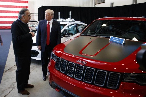 President Donald Trump talks with Fiat Chrysler CEO Sergio Marchionne during a tour at the American Center of Mobility, Wednesday, March 15, 2017, in Ypsilanti Township, Mich. (ANSA/AP Photo/Evan Vucci) [CopyrightNotice: Copyright 2017 The Associated Press. All rights reserved.]