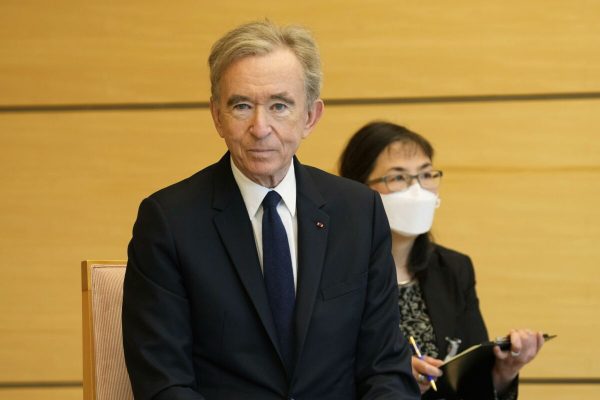 epa09922177 LVMH Moet Hennessy Louis Vuitton CEO Bernard Arnault waits for Japanese Chief Cabinet Secretary Hirokazu Matsuno (not pictured) at the Prime Ministers Office in Tokyo, Japan, 02 May 2022.  EPA/Hiro Komae / POOL