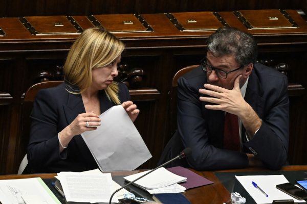 Italian Prime Minister, Giorgia Meloni (L), with Italian Minister of Economy, Giancarlo Giorgetti (R), ahead of a confidence vote for the new government, at the Chamber of Deputies, the lower house of parliament, in Rome, Italy, 25 October 2022. ANSA/RICCARDO ANTIMIANI