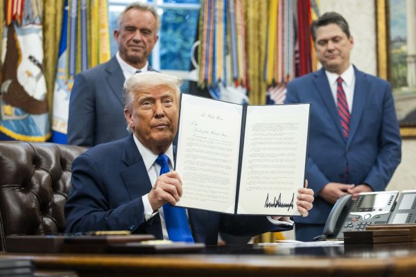 May 5, 2025, Washington, District Of Columbia, USA: United States President Donald J Trump holds up one of a a series of executive orders he signed related to health care in the Oval Office of the White House in Washington, DC USA, 05 May 2025. Trump said he would soon make an announcement on health care that would be âmore related to costs, the costs of medicine and drugs. (Credit Image: © Jim Loscalzo - Pool Via Cnp/CNP via ZUMA Press Wire)